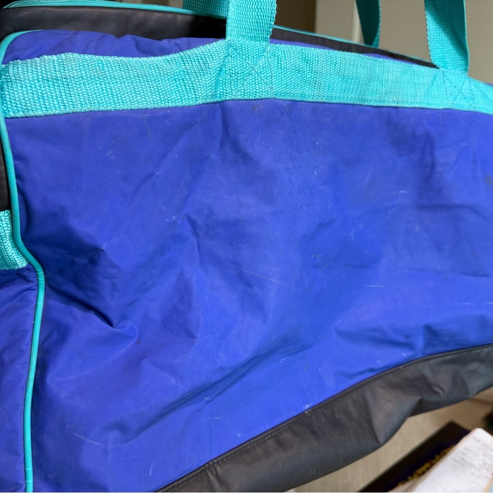 Blue and Black Duffel Bag
